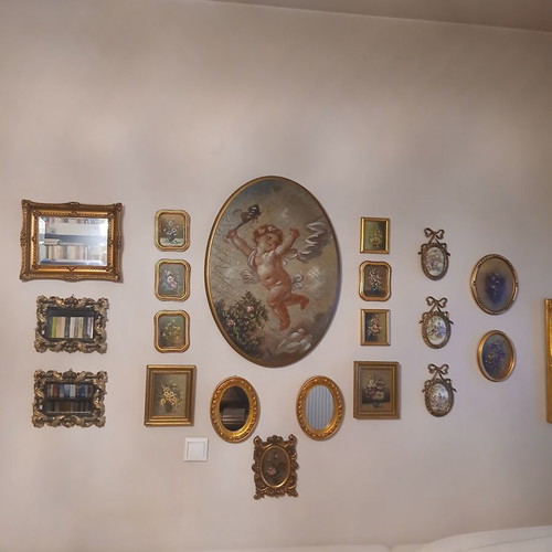 Various small framed paintings and mirrors