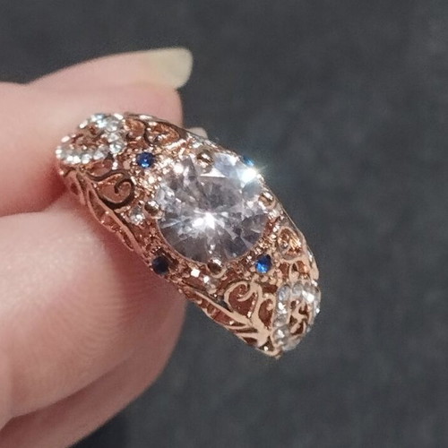 Elegance rose gold ring with white and blue stones