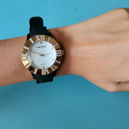 Calypso women's watch like new, black with gold and zircon