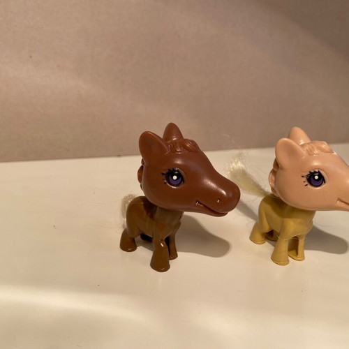 Set of small plastic pony figures like new