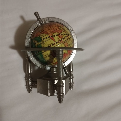 Globe pencil sharpener like new, metal decorative