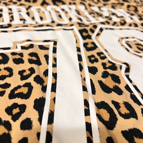 H&M Divided T-shirt with animal print and "Brooklyn 78" print like new, size M
