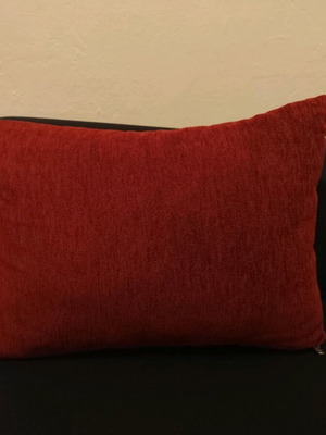 Decorative red pillow like new, 30 x 44 cm