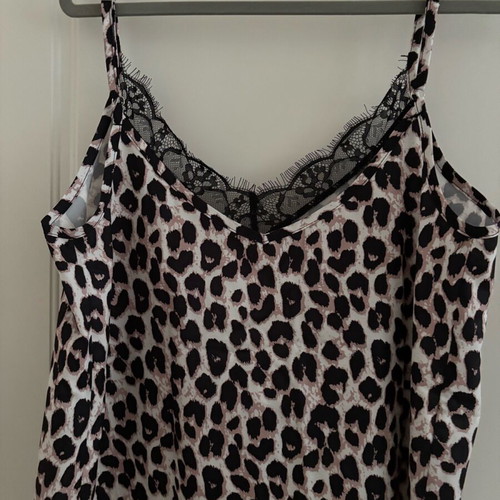 Women's leopard print top like new with black lace