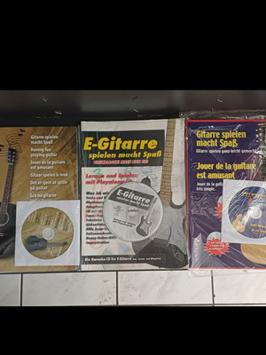 Guitar learning methods with CDs in German, acoustic and electric