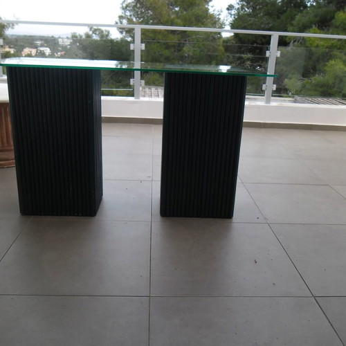 Console table used with 2 blue/navy bases and glass top