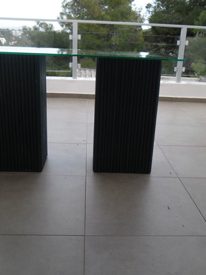 Console table used with 2 blue/navy bases and glass top