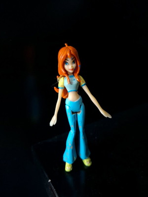 Winx Club Bloom doll used with paint defects