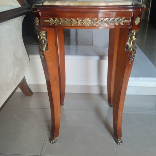 Antique table with marble top and bronze caryatids