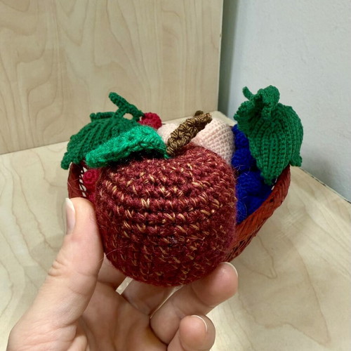 Basket with handmade fruit decoration