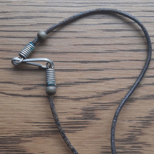 Aris pendant vintage with leather cord used
