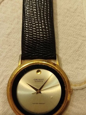 Orient Quartz men's vintage watch like new with gold dial and leather strap