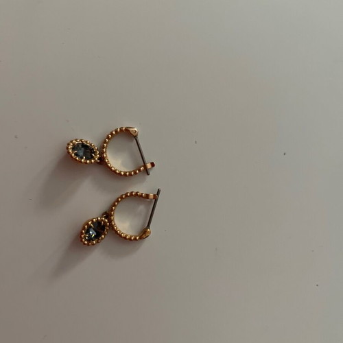 Swarovski earrings like new, gold with gray stone