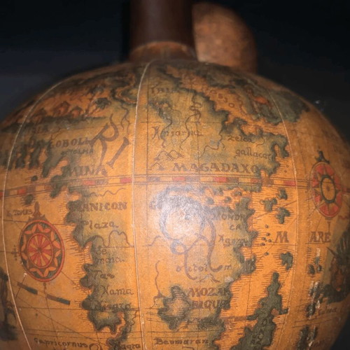 Vintage wine bottle used with Old World map design