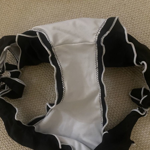 M&D black swimsuit used, fits small and medium sizes