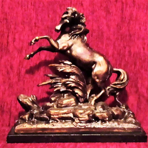 Bronze horse on wooden base like new