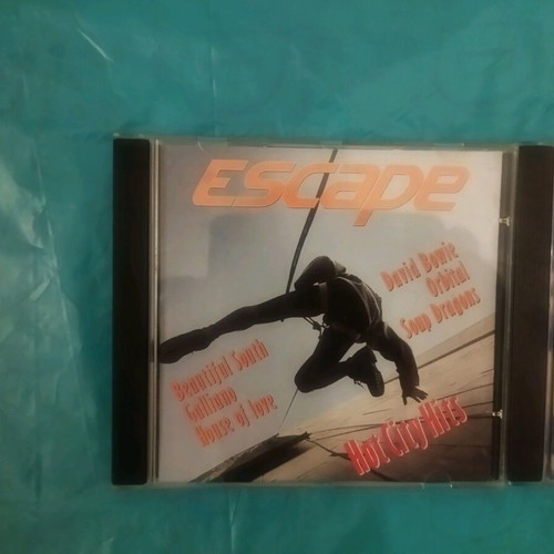 Escape Hot City Hits and Snow Motion Music CDs like new