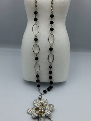 Necklace with black beads and metal flower like new