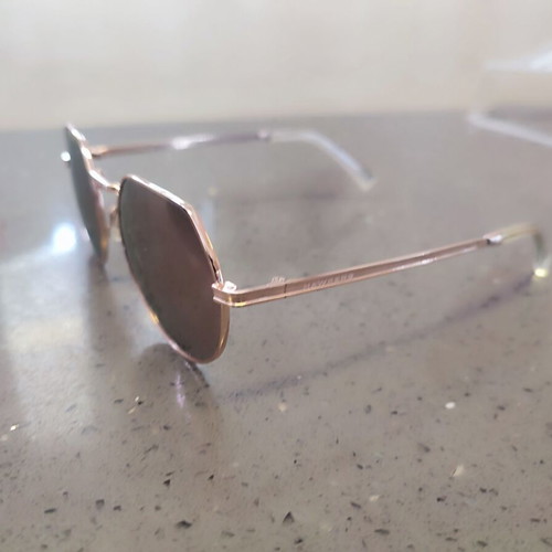 Hawkers unisex sunglasses used, rose gold