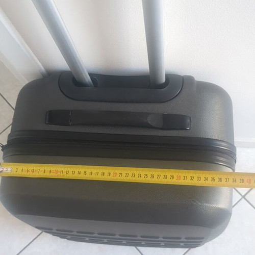 Medium hard suitcase gray used with two wheels