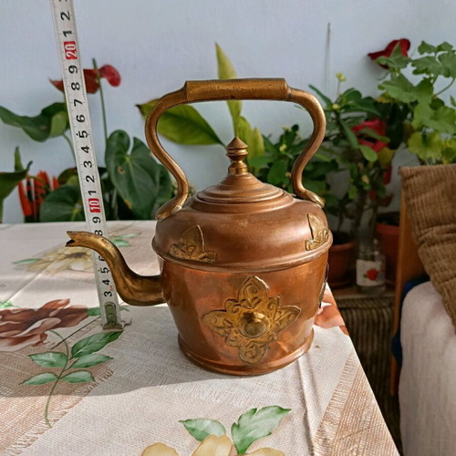 French teapot used with vintage brass decoration