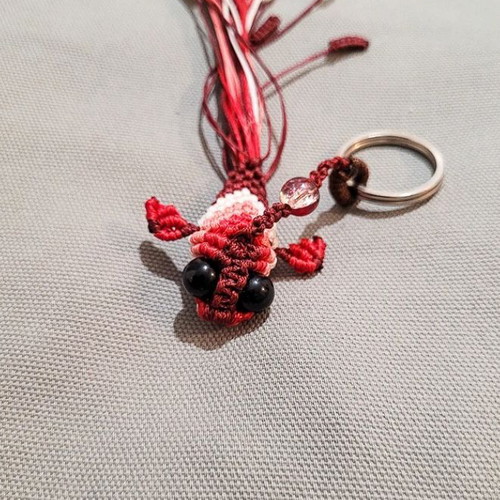 Macrame koi fish keychain like new, red and pink