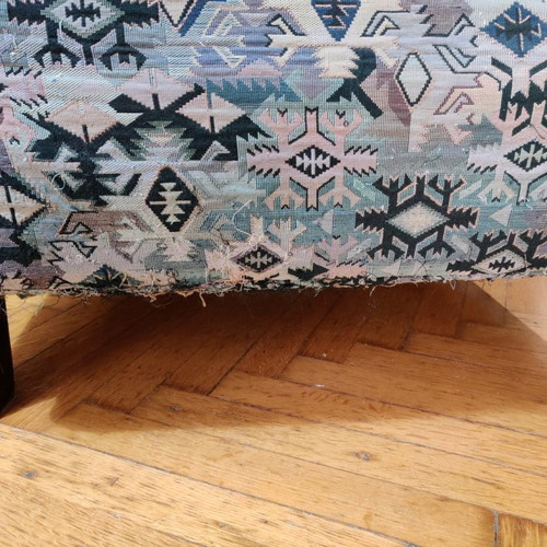 Armchair used made of good wood with fabric cover