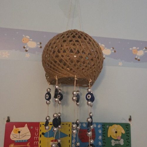 Ceiling decoration with blue matohandra beads, about 70 cm height