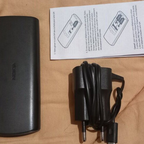 Nokia 106 dual sim used for parts with charger and box