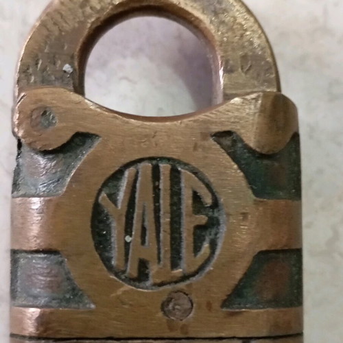 Yale padlock used, vintage possibly 1920-1930 with wear and patina