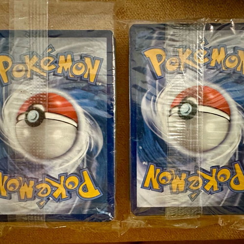 Pokémon Energy new, 2 sealed 2022 packs and 2 holofoil Mega evolutions