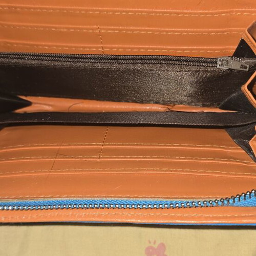 Wallet used, blue with orange details