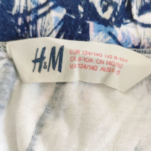 H&M asymmetrical summer skirt with tropical print, blue and white