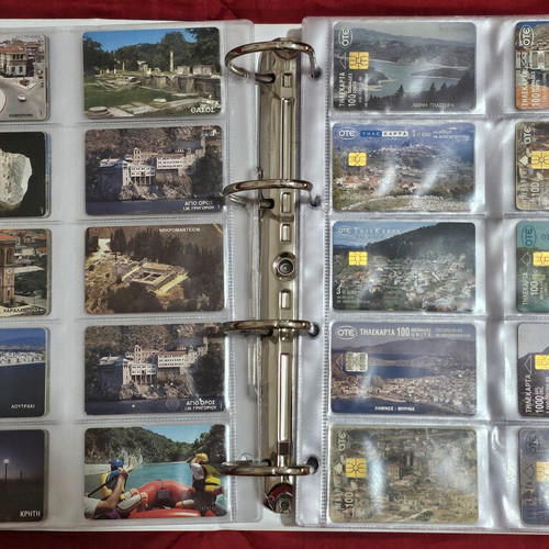 Phone cards used, album with 560 pieces