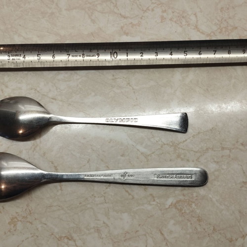 Collectible Olympic and British Airways spoons used, very good condition
