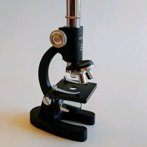 Hobby educational microscope used with 3 lenses and lighting