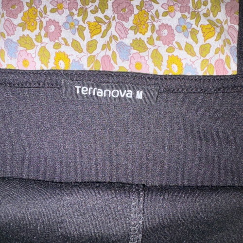 Black sleeveless shirt used with buttons, size M