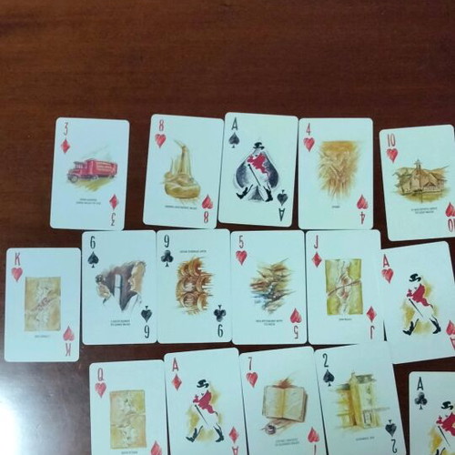 Johnnie Walker collectible playing cards laminated in metal box like new