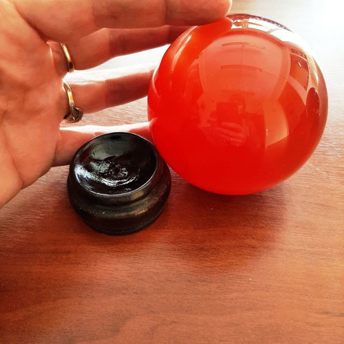 Indian crystal sphere red color on wooden base new