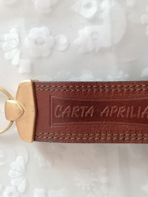 Leather keychain Carta Aprilia like new, brown and gold