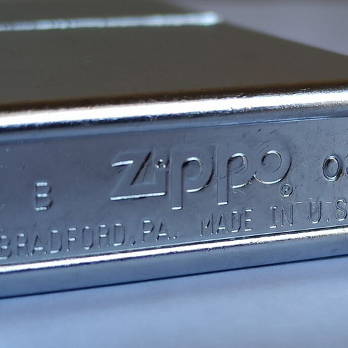 Zippo vintage lighter 2003, new, embossed design
