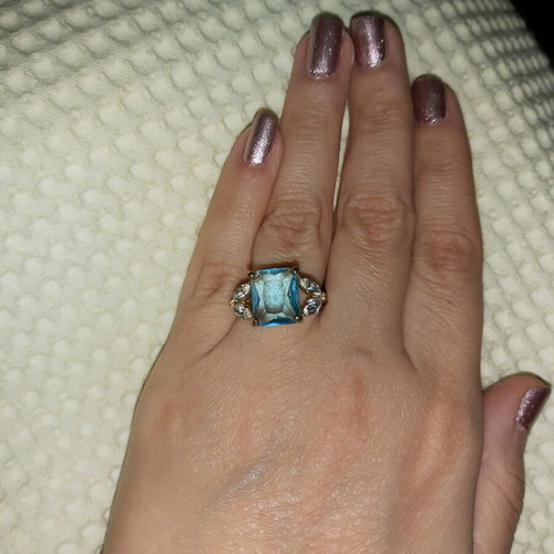 Ring with blue stone and 4 rhinestones, new, gold color