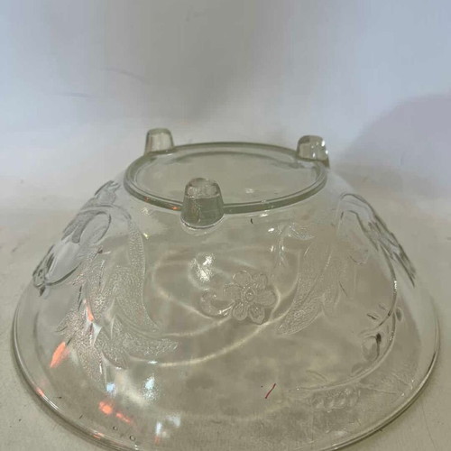 Vintage glass bowl with feet and flower patterns used