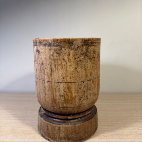 Rustic handmade wooden mortar used