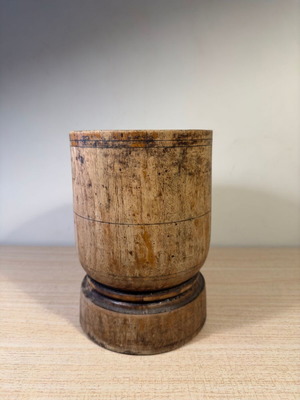 Rustic handmade wooden mortar used