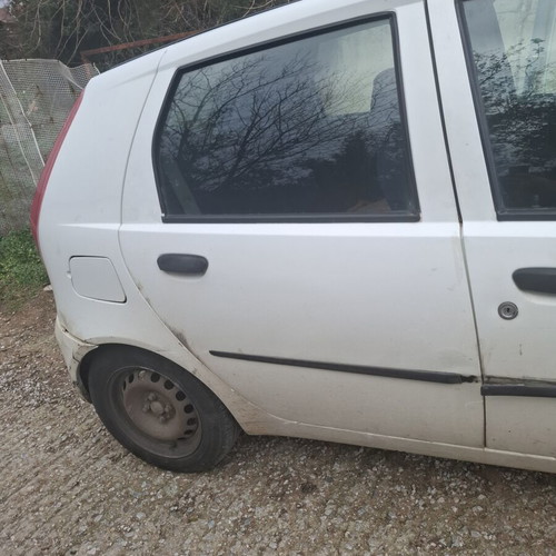 Fiat Punto used, gas, manual, white, new front wheels and shock absorbers