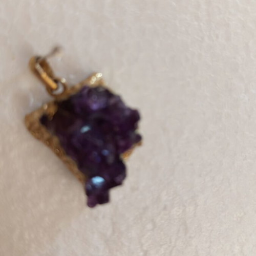 Necklace with amethyst energy crystal