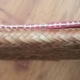 Oysho straw handbag used with boho pom pom design