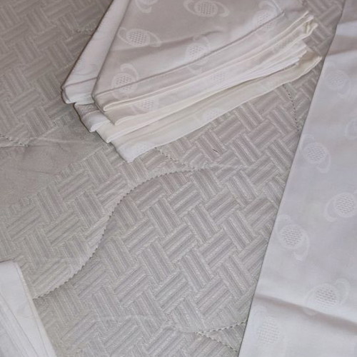 Tablecloth set with 12 napkins used, white
