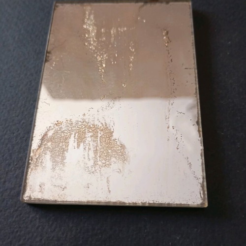 Mirror used with guitar strings Drepanis theme